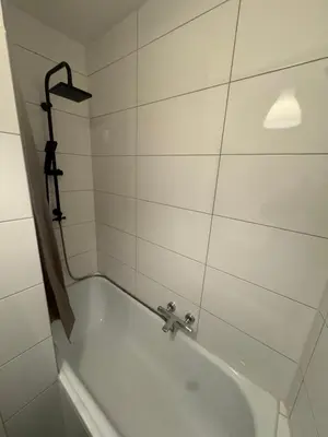 Ein Badezimmer in der Unterkunft Modernes City Apartment 2 Min zum HBF Mülheim