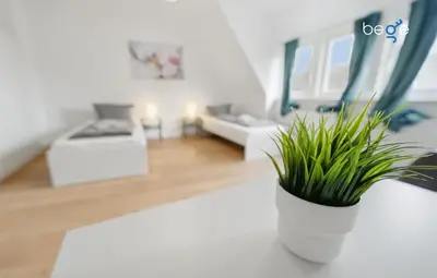 Ein Bett oder Betten in einem Zimmer der Unterkunft BEGE APARTMENTS UrbanStay