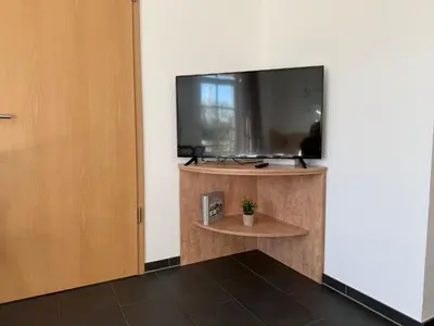 TV/Unterhaltungsangebot in der Unterkunft Modernes Studio am Hafen Bergkamen - Hannah