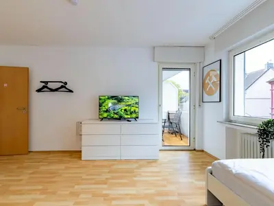 TV/Unterhaltungsangebot in der Unterkunft BudgetRoom 3 SZ Balkonwohnung für Teams