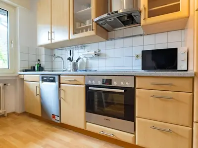 Küche/Küchenzeile in der Unterkunft BudgetRoom 3 SZ Balkonwohnung für Teams