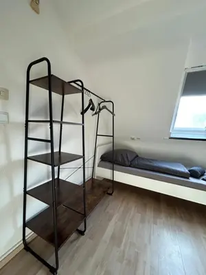 Ein Bett oder Betten in einem Zimmer der Unterkunft Studio Apartment Essen