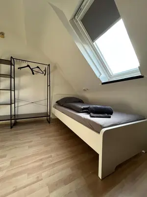 Ein Bett oder Betten in einem Zimmer der Unterkunft Studio Apartment Essen