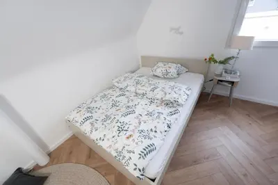 Ein Bett oder Betten in einem Zimmer der Unterkunft Haus in Duisburg