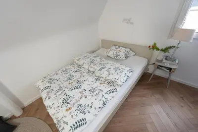 Ein Bett oder Betten in einem Zimmer der Unterkunft Haus in Duisburg