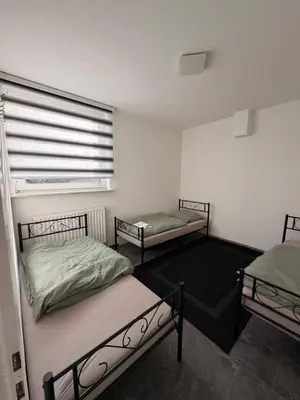 Ein Bett oder Betten in einem Zimmer der Unterkunft A2 MonteurQuatier Lünen