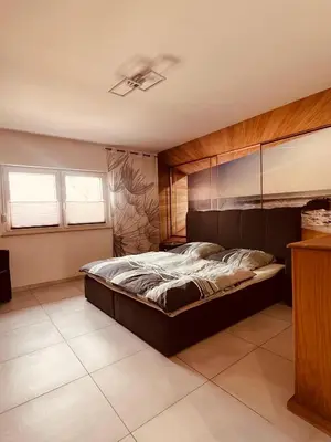 Ein Bett oder Betten in einem Zimmer der Unterkunft FeWo Schicht im Schacht