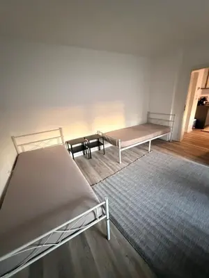 Ein Bett oder Betten in einem Zimmer der Unterkunft WorkHome A2 zu 3
