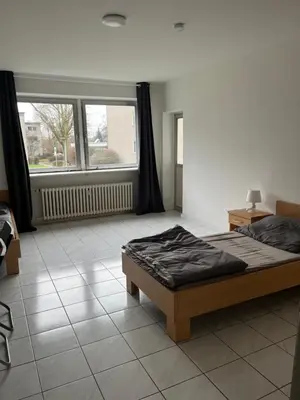 Ein Bett oder Betten in einem Zimmer der Unterkunft 5 Betten Unterkunft in Werne