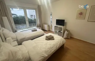 Ein Bett oder Betten in einem Zimmer der Unterkunft BEGE APARTMENTS CozyWork