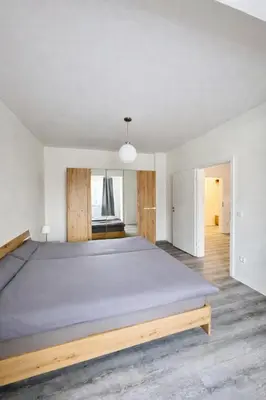 Ein Bett oder Betten in einem Zimmer der Unterkunft Helle Erdgeschosswohnung in Hamm für bis zu 4 Personen
