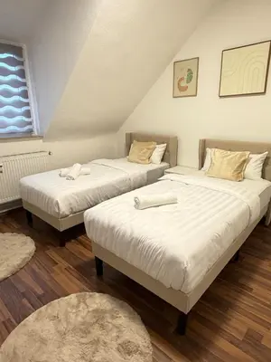 Ein Bett oder Betten in einem Zimmer der Unterkunft Moderne & praktische Wohnung nahe Messe Essen