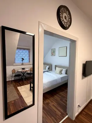 Ein Bett oder Betten in einem Zimmer der Unterkunft Moderne & praktische Wohnung nahe Messe Essen