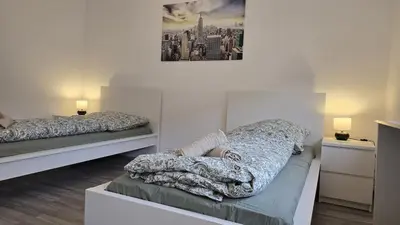 Ein Bett oder Betten in einem Zimmer der Unterkunft HagenStay Delstern 2