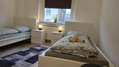 Ein Bett oder Betten in einem Zimmer der Unterkunft HagenStay Delstern 2