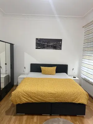 Ein Bett oder Betten in einem Zimmer der Unterkunft Sauberes Apartment in Hamm