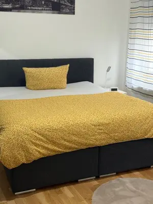 Ein Bett oder Betten in einem Zimmer der Unterkunft Sauberes Apartment in Hamm
