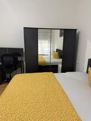 Ein Bett oder Betten in einem Zimmer der Unterkunft Sauberes Apartment in Hamm