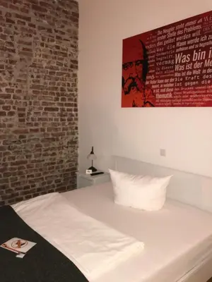 Ein Bett oder Betten in einem Zimmer der Unterkunft home2be apartments