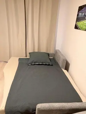 Ein Bett oder Betten in einem Zimmer der Unterkunft Living in the heart of Kreuzviertel!