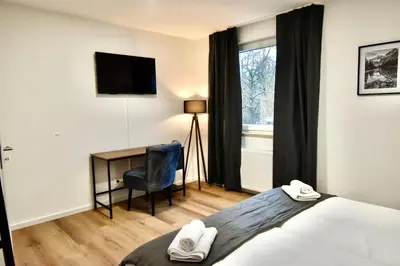 Ein Bett oder Betten in einem Zimmer der Unterkunft SANO - Hagen - Am Rastebaum