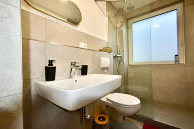 Ein Badezimmer in der Unterkunft SANO - Hagen - Am Rastebaum