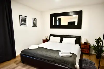 Ein Bett oder Betten in einem Zimmer der Unterkunft SANO - Hagen - Am Rastebaum