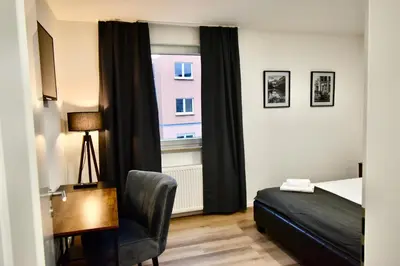 Ein Bett oder Betten in einem Zimmer der Unterkunft SANO - Hagen - Am Rastebaum