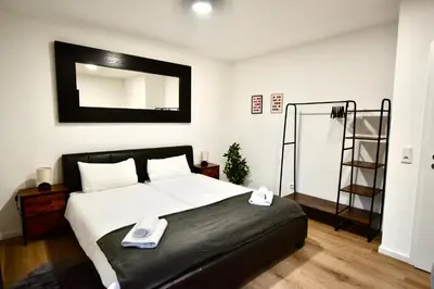Ein Bett oder Betten in einem Zimmer der Unterkunft SANO - Hagen - Am Rastebaum
