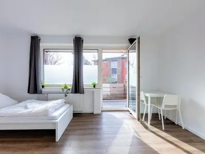 Ein Bett oder Betten in einem Zimmer der Unterkunft BudgetRoom 3 Schlafzimmer Workers Home