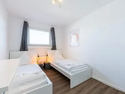 Ein Bett oder Betten in einem Zimmer der Unterkunft BudgetRoom 3 Schlafzimmer Workers Home