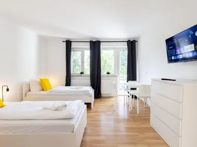 Ein Bett oder Betten in einem Zimmer der Unterkunft BudgetRoom 3 Schlafzimmer Workers Home