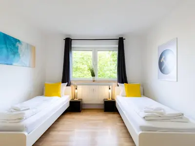 Ein Bett oder Betten in einem Zimmer der Unterkunft BudgetRoom 3 Schlafzimmer Workers Home