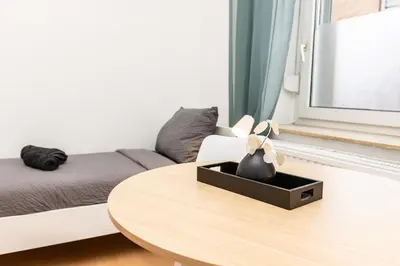 Ein Bett oder Betten in einem Zimmer der Unterkunft CosyHomes24 - TOP traffic connection and balcony - UN02a