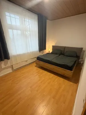 Ein Bett oder Betten in einem Zimmer der Unterkunft Simba Apartment - zentral, ruhig