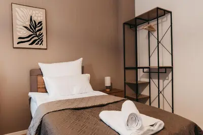 Ein Bett oder Betten in einem Zimmer der Unterkunft ATLAS Apartment 6 Oberhausen, 3 Zimmer, Nähe Bahnhof, Westfield Centro