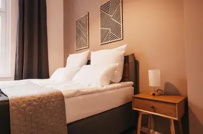 Ein Bett oder Betten in einem Zimmer der Unterkunft ATLAS Apartment 6 Oberhausen, 3 Zimmer, Nähe Bahnhof, Westfield Centro