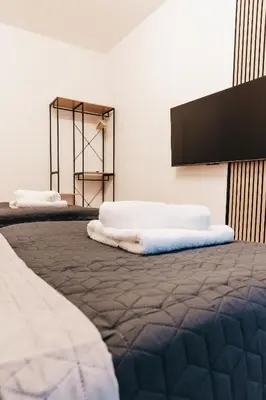 Ein Bett oder Betten in einem Zimmer der Unterkunft ATLAS Apartment 6 Oberhausen, 3 Zimmer, Nähe Bahnhof, Westfield Centro