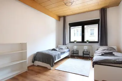 Ein Bett oder Betten in einem Zimmer der Unterkunft Feel good and rest well - Apartments for workers and tourists 1-4 person - WiFi - Smart TV - Garden