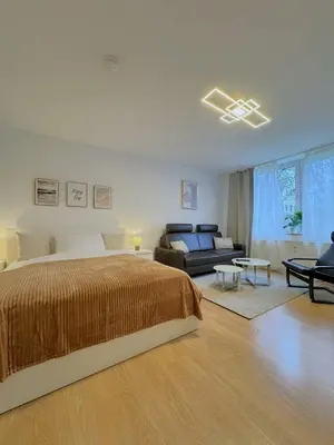 Ein Bett oder Betten in einem Zimmer der Unterkunft Dein Apartment mit Queensize Bett im Erdgeschoss