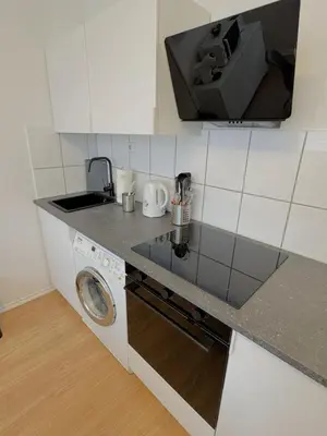 Küche/Küchenzeile in der Unterkunft Dein Apartment mit Queensize Bett im Erdgeschoss
