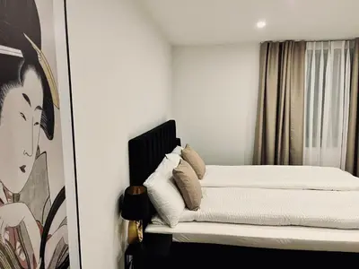 Ein Bett oder Betten in einem Zimmer der Unterkunft Plus31
