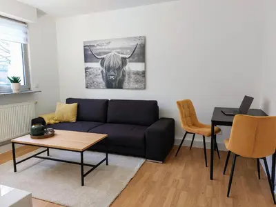 Ein Sitzbereich in der Unterkunft Helle, moderne Wohnung, 2 Schlafzimmer, Nähe Düsseldorf, W-LAN