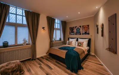 Ein Bett oder Betten in einem Zimmer der Unterkunft Deluxe Suite Hafennah