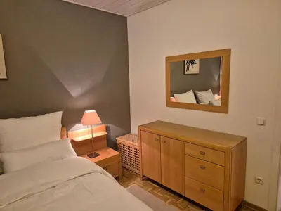 Ein Bett oder Betten in einem Zimmer der Unterkunft Komfortable 3-Zimmer- Wohnung