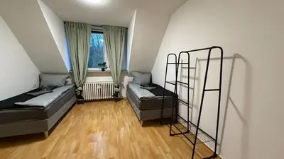 Ein Bett oder Betten in einem Zimmer der Unterkunft Monteurwohnung 3 Ferienwohnung Business Appartement Velbert 6 Personen
