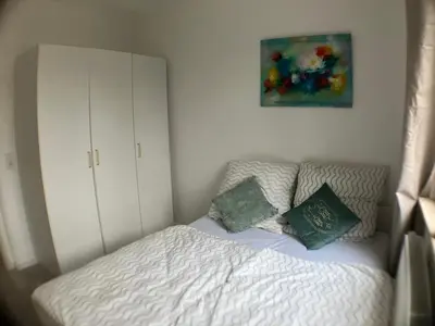 Ein Bett oder Betten in einem Zimmer der Unterkunft Rue118