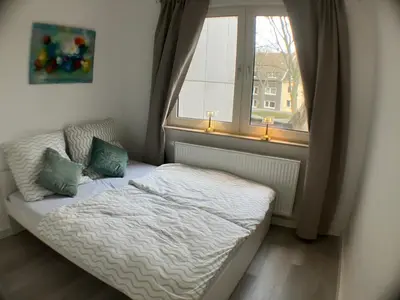 Ein Bett oder Betten in einem Zimmer der Unterkunft Rue118