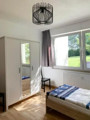 Ein Bett oder Betten in einem Zimmer der Unterkunft Apartments Hemer