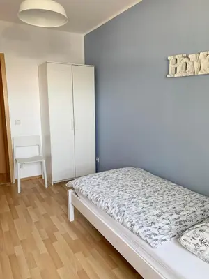 Ein Bett oder Betten in einem Zimmer der Unterkunft Apartments Hemer